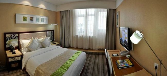 Solar Valley Micro E International Hotel Dezhou Номер фото